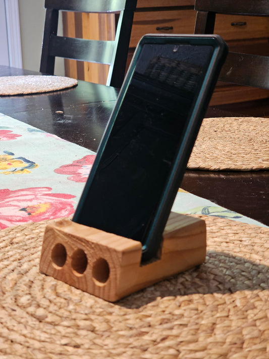 Pine phone stand with sound redirection