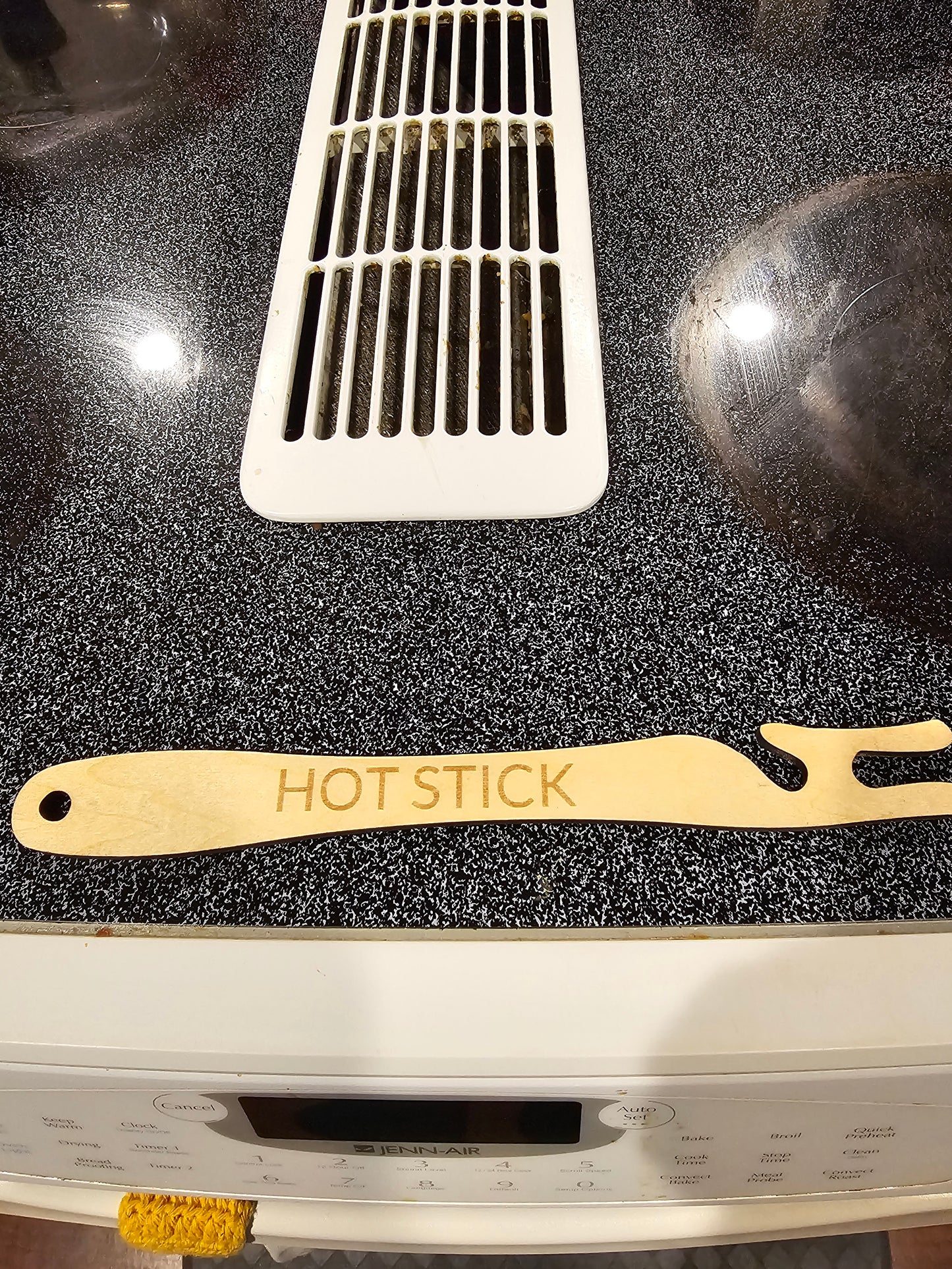 Oven rack push/pull stick.