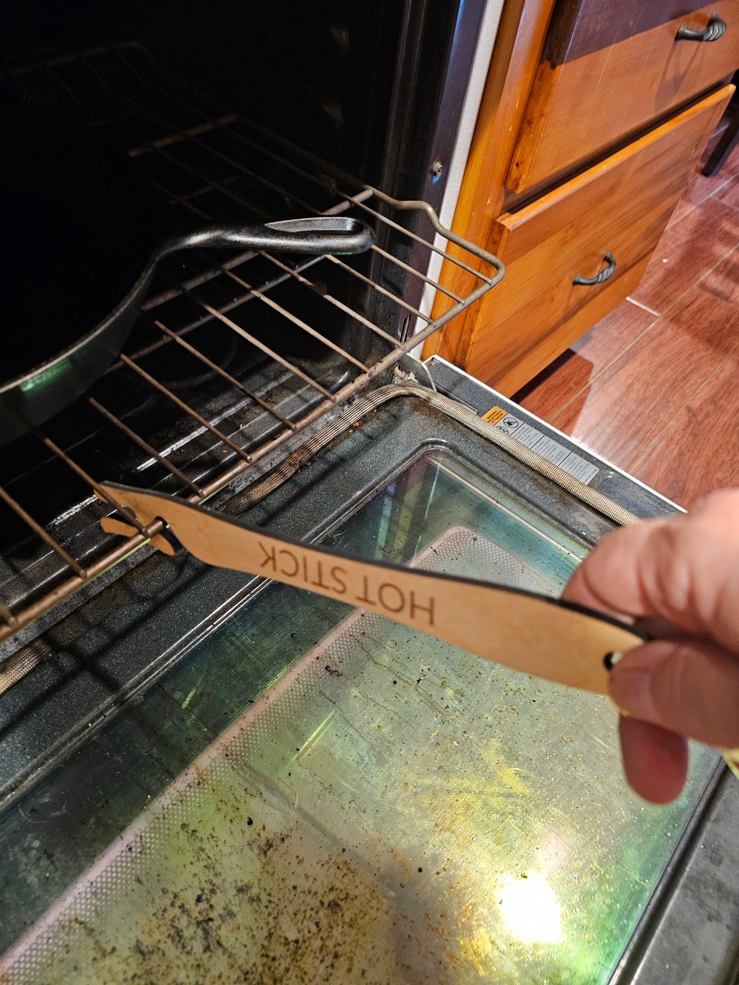 Oven rack push/pull stick.