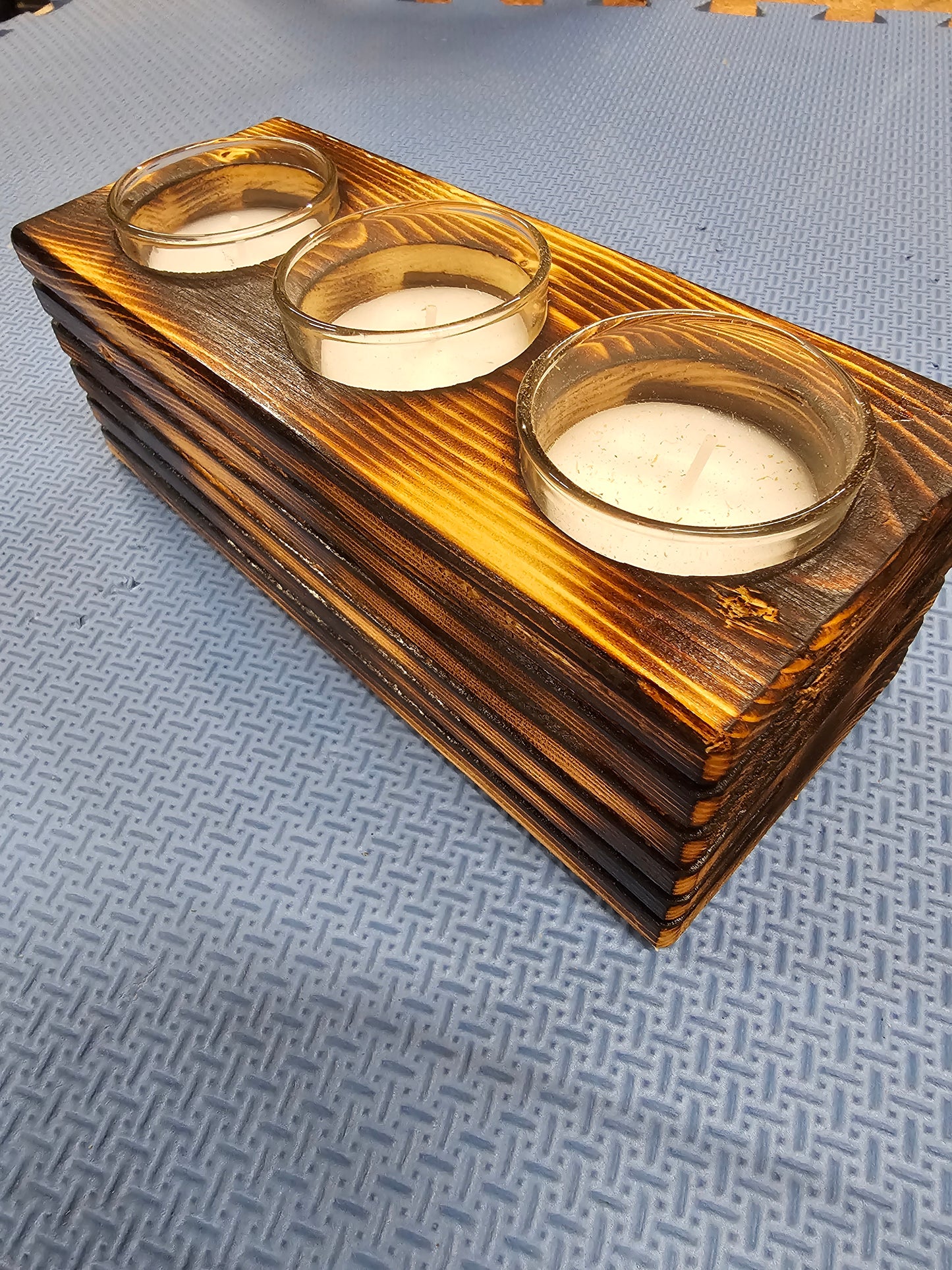 Decorative votive or LED tealite candle holder.