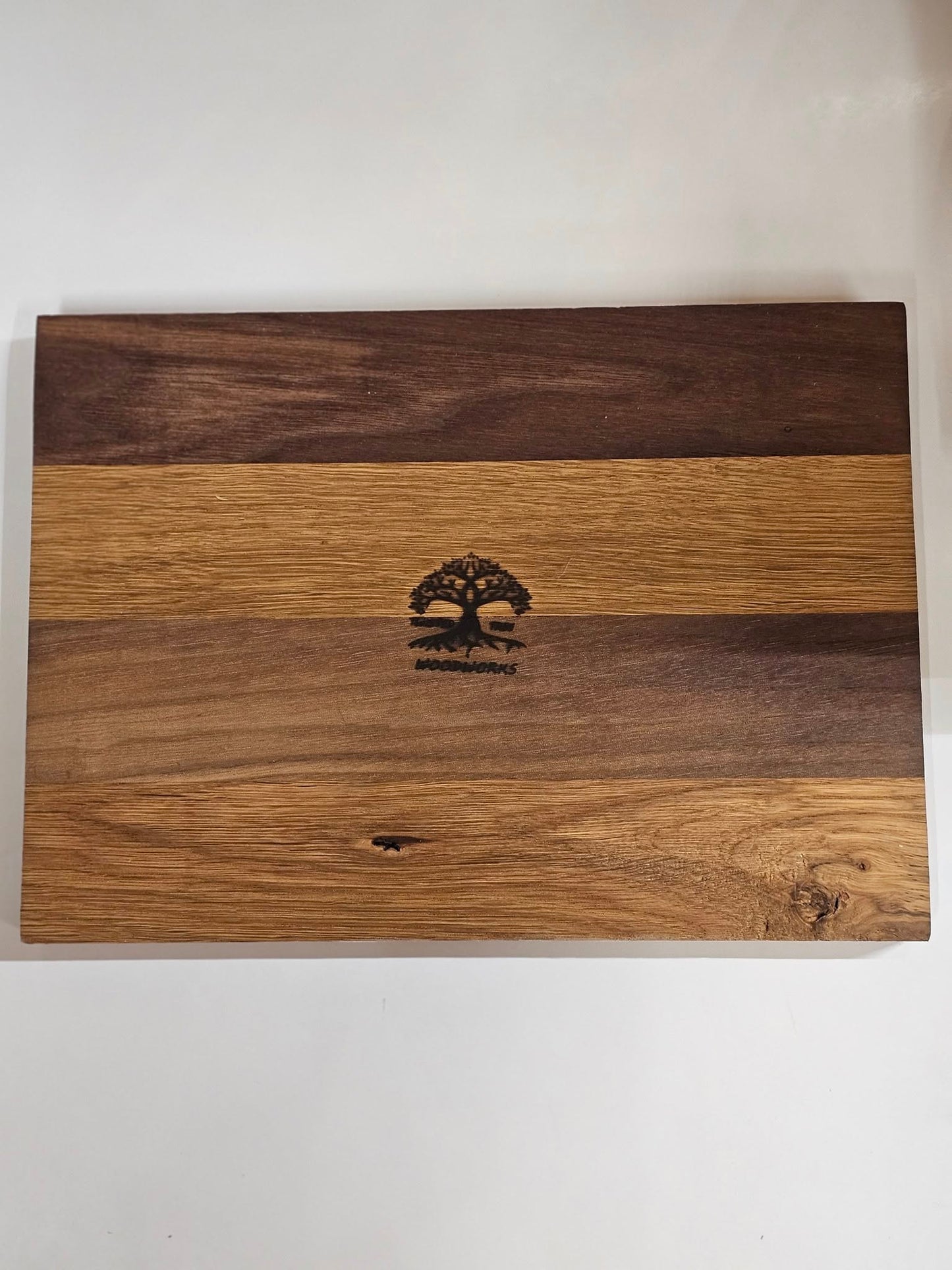 Dark American walnut and white oak cutting board. Small