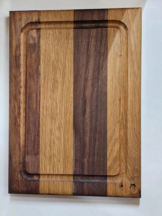 Dark American walnut and white oak cutting board. Small