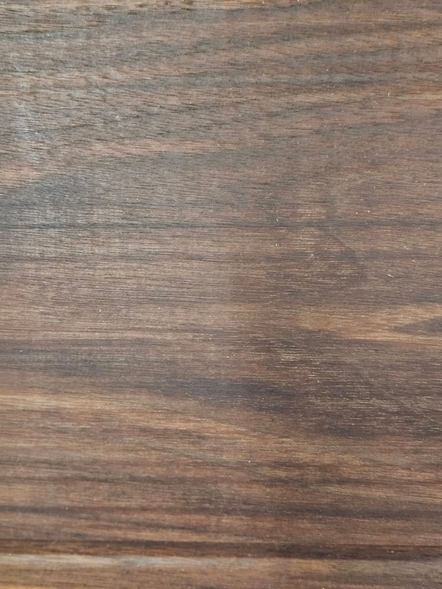 Dark American walnut cutting board. Medium size