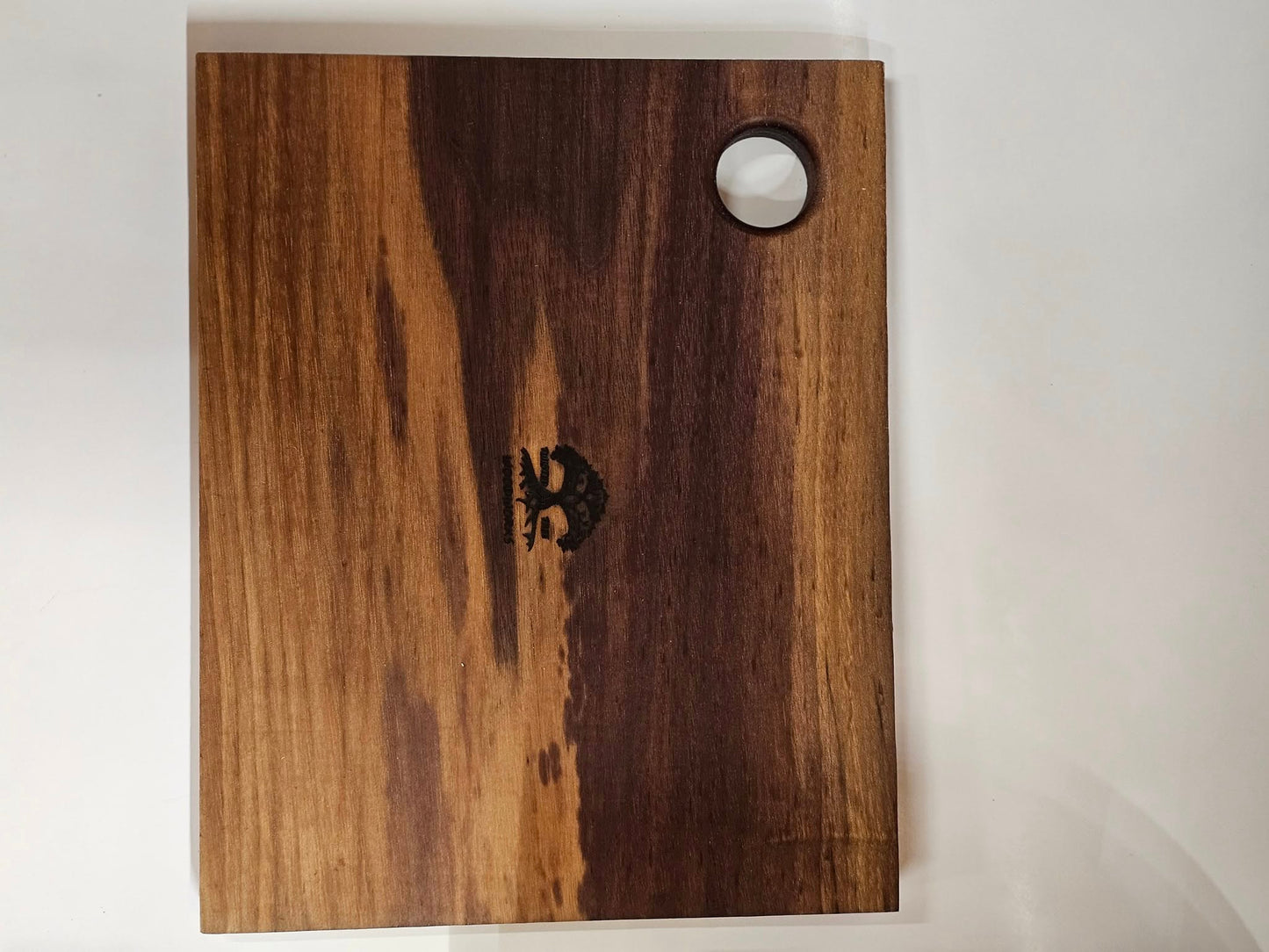 Dark American walnut cutting board. Medium size